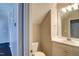 Cozy bathroom features a white vanity with sink, a toilet, and neutral wall color at 1212 Southgate Dr, Raleigh, NC 27610
