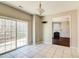 Light-filled dining area with sliding glass doors and easy access to a fireplace-equipped living space at 1212 Southgate Dr, Raleigh, NC 27610