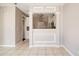 A well-lit dining area showcasing classic molding and an open layout to the kitchen at 1212 Southgate Dr, Raleigh, NC 27610