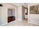 Bright dining area featuring tile floors, open archways, and easy access to the kitchen at 1212 Southgate Dr, Raleigh, NC 27610