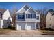Charming two-story home with attached two-car garage and well-maintained yard at 1212 Southgate Dr, Raleigh, NC 27610