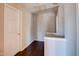 Upstairs hallway with wood-look flooring at 1212 Southgate Dr, Raleigh, NC 27610