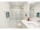 Clean bathroom with a walk-in shower and white vanity at 1309 Hudson Ave # A7, Durham, NC 27705
