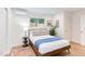 Bright bedroom with a comfortable bed and wood floors at 1309 Hudson Ave # A7, Durham, NC 27705