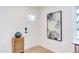 Welcoming entryway with a decorative vase, sleek door design, and modern art piece at 1309 Hudson Ave # A7, Durham, NC 27705
