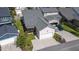 Aerial view of the home featuring a screened-in porch and two-car garage at 167 Logbridge Rd, Chapel Hill, NC 27516