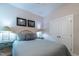 Comfortable bedroom with double door closet, bedside lamps, and cozy bedding at 167 Logbridge Rd, Chapel Hill, NC 27516