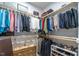Walk-in closet with shelving, hanging rods, and compartments for organized storage at 167 Logbridge Rd, Chapel Hill, NC 27516