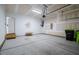 This garage is empty, with a door to the house on the left at 167 Logbridge Rd, Chapel Hill, NC 27516