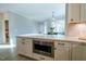 Modern kitchen featuring a center island, stainless steel microwave, and bright interior at 167 Logbridge Rd, Chapel Hill, NC 27516