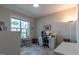 Office features large window for natural light, along with work space and room to sit at 167 Logbridge Rd, Chapel Hill, NC 27516