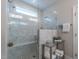 This bathroom features a stand up shower with glass enclosure and window for natural light at 167 Logbridge Rd, Chapel Hill, NC 27516