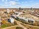 Beautiful aerial view of city and surrounding neighborhood, showcasing skyline, nearby buildings, and road system at 600 S Duke St # 26, Durham, NC 27701