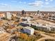 Aerial view of the city during the day, with a blue sky and scattered clouds at 600 S Duke St # 26, Durham, NC 27701