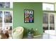 Inviting common area with bright green walls, comfortable seating, and large windows at 600 S Duke St # 26, Durham, NC 27701
