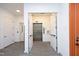 A modern building elevator with stainless steel doors is accessible from a brightly lit hallway at 600 S Duke St # 26, Durham, NC 27701
