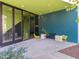 Building entrance with seating area, planters and a stylish green accent wall at 600 S Duke St # 26, Durham, NC 27701