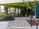 Property entrance features a modern walkway and lush greenery at 600 S Duke St # 26, Durham, NC 27701