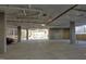 Large parking garage featuring concrete floors and walls, with car parking and exit sign at 600 S Duke St # 26, Durham, NC 27701