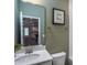 Clean bathroom with a modern vanity and view to living area at 764 Denburn Pl, Raleigh, NC 27603