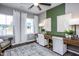 Home office with a large desk and two comfortable chairs at 764 Denburn Pl, Raleigh, NC 27603