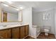 A well-maintained bathroom features a double sink vanity, a bathtub, and updated fixtures at 1705 Old Nc 10 Hwy, Hillsborough, NC 27278