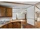 Traditional kitchen with wood cabinets and breakfast bar offers a functional layout at 1705 Old Nc 10 Hwy, Hillsborough, NC 27278