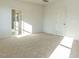 Bedroom featuring neutral carpet, and an ensuite bathroom with a glass shower at 1804 Bright Lantern Way, Wendell, NC 27591