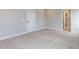 Bedroom with neutral carpet, closet and en-suite bathroom at 1804 Bright Lantern Way, Wendell, NC 27591