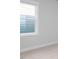 Bedroom with a gray paint and carpet and a window with a white frame at 1804 Bright Lantern Way, Wendell, NC 27591