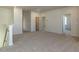 Spacious bonus room or loft area with neutral carpet and multiple entryways at 1804 Bright Lantern Way, Wendell, NC 27591