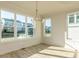 Bright dining room with large windows offering backyard views and natural light at 1804 Bright Lantern Way, Wendell, NC 27591