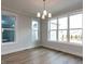 Bright and sunny living room with hardwood floors and large windows at 1804 Bright Lantern Way, Wendell, NC 27591