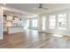 Bright living space with kitchen island, recessed lighting, and wood flooring at 1804 Bright Lantern Way, Wendell, NC 27591