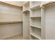 Well-organized walk-in closet with custom shelving and ample storage space at 1804 Bright Lantern Way, Wendell, NC 27591