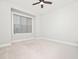 Bright bedroom with neutral walls, carpeted floors, and a large window at 503 Bendemeer Ln, Rolesville, NC 27571
