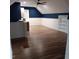 Spacious bonus room with wood floors and ceiling fan at 503 Bendemeer Ln, Rolesville, NC 27571