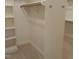 Spacious closet with built-in shelving and hanging rods at 503 Bendemeer Ln, Rolesville, NC 27571