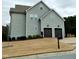 Gray sided two story house with a two car garage and landscaped yard at 503 Bendemeer Ln, Rolesville, NC 27571