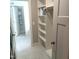 Spacious laundry room with built-in shelving and storage at 503 Bendemeer Ln, Rolesville, NC 27571