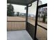 Screened porch overlooking a fenced backyard at 503 Bendemeer Ln, Rolesville, NC 27571