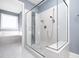 Large walk-in shower with glass enclosure and stylish tile at 503 Bendemeer Ln, Rolesville, NC 27571