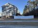 Exterior view of townhouses with private fenced yards at 5200 Stream Stone Way, Raleigh, NC 27616