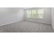 Bedroom with carpet and natural light at 55 New Liberty Dr, Youngsville, NC 27596