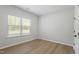 Cozy bedroom with hardwood floors and natural light at 55 New Liberty Dr, Youngsville, NC 27596