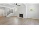 Spacious living room with hardwood floors and fireplace at 55 New Liberty Dr, Youngsville, NC 27596