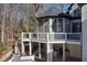 Beautiful backyard deck featuring outdoor kitchen and screened-in porch at 6701 Green Hollow Ct, Wake Forest, NC 27587
