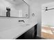 Sleek bathroom with black and white accents and modern vanity at 6701 Green Hollow Ct, Wake Forest, NC 27587