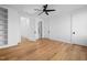Spacious bedroom with hardwood floors and a walk-in closet at 6701 Green Hollow Ct, Wake Forest, NC 27587