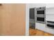 Modern gourmet kitchen features a built-in refrigerator and double wall ovens at 6701 Green Hollow Ct, Wake Forest, NC 27587